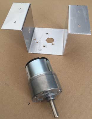 Motor and cradle