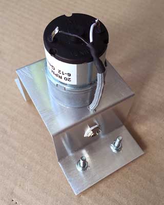 Motor and cradle